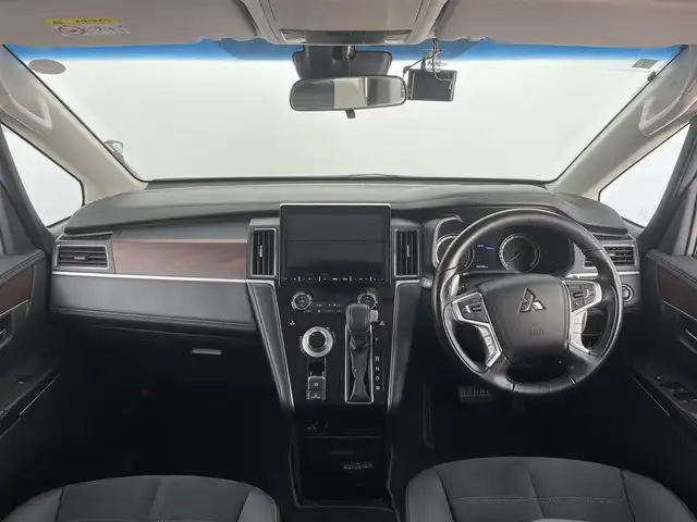 三菱 デリカＤ：５ ジャスパー 大分県 2021(令3)年 5万km パール 4WD/純正10.1型ナビ/　BT/CD/DVD/フルセグ/純正フリップダウンモニター/レーダークルーズコントロール/両側パワースライドドア/バックカメラ/オートブレーキホールド/撥水機能付きハーフレザーシート/オートマチックハイビーム/LEDヘッドライト/ステアリングリモコン/革巻ステアリング/チップアップシート/フルフラットシート/純正アルミホイル18インチ/純正フロアマット/MTモード