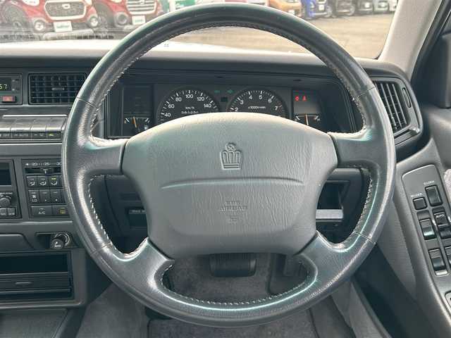 トヨタ クラウン ワゴン ロイヤルエクストラ ツーリング 愛知県 1997(平9)年 8.2万km スーパーホワイトⅡ 禁煙車/ツーリングセレクション/ブラックルーフレール/サイドモール/純正カーオーディオ/FM/AMラジオ/MDチェンジャー/オートライト/オートエアコン/革巻きステアリング/シフトノブ/ファブリックシート/純正15インチAW/純正フロアマット/サイドバイザー/電格ミラー