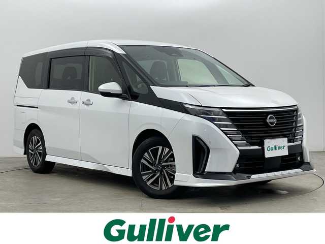 日産 セレナ ハイウェイスター V 富山県 2023(令5)年 2.7万km プリズムホワイト １オーナー/メーカーＯｐ．１２．３型ナビ/　　－－bluetooth CarPlay AndroidAuto　/フルセグＴＶ/HDMI/全周囲カメラ　/前後コーナーセンサー　/ETC２．０/両側ハンズフリーパワスラ/純正フロントスポイラー　/純正前後ドラレコ/デジタルインナーミラー　/プロパイロット/前方衝突防止支援/車線逸脱警報・防止支援/後側方車両検知警報・衝突防止支援/踏間違い衝突防止支援/オートホールド/オートライト/LED/フォグ/パドルシフト/横滑防止装置/スマートキー＋プッシュスタート/純正マット・バイザー/保証書/スペアキー