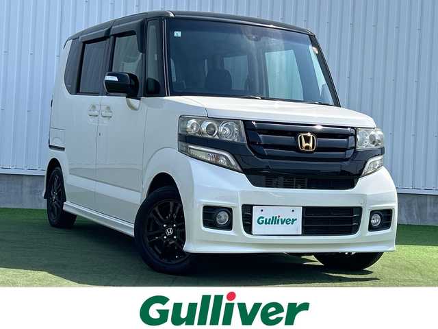 ホンダ Ｎ ＢＯＸ カスタム G Lパッケージ 香川県 2015(平27)年 4.8万km プレミアムホワイトパール 純正メモリーナビ/→AM/FM/CD/DVD/Bluetooth/ワンセグTV/バックカメラ/前後ドライブレコーダー/両側パワースライドドア/ETC/純正14インチアルミホイール/ステアリングスイッチ/革巻きステアリング/アイドリングストップ/HIDヘッドライト/サンシェード/プッシュスタート/スマートキー