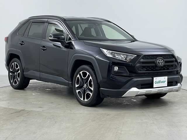 トヨタ ＲＡＶ４ アドベンチャー 道央・札幌 2019(令1)年 7.7万km アティチュードブラックマイカ ・４WD/・ワンオーナー/・社外9インチナビ(KENWOOD MDV-M906HDL)/　Bluetooth/フルセグTV/CD/DVD/・トヨタセーフティセンス/　プリクラッシュセーフティ/　誤発進抑制/　レーントレーシングアシスト/　レーダークルーズコントロール/　オートハイビーム/・バックカメラ/・ビルトインETC/・前後ドライブレコーダー/・ダウンヒルアシスト/・LEDヘッドランプ/・フォグランプ/・ドアバイザー/・純正19インチアルミホイール/・合皮シート/・パワーシート(D席)/・サイド+カーテンエアバッグ/・社外フロアマット/・スマートキー×2本/・保証書、取扱説明書付属