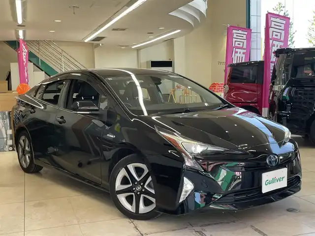 トヨタ プリウス A プレミアム　ツーリングセレ 東京都 2016(平28)年 7.1万km アティチュードブラックマイカ △純正メモリーナビ/　CD/DVD/BT/フルセグ/△バックカメラ/△ETC/△革シート/△革巻きステアリング/△LEDライト/△オートライト/△純正フォグ/△レーダークルーズコントロール/△ステアリングスイッチ/△フロアマット/△ISOFIX/△前席シートヒーター/△プリクラッシュセーフティシステム/△BSM/△パーキングアシスト/△横滑り防止/△クリアランスソナー/△オートハイビームアシスト/△AC１００電源/△プライバシーガラス/△LEDルームランプ/△TVキャンセラー/△ドアバイザー