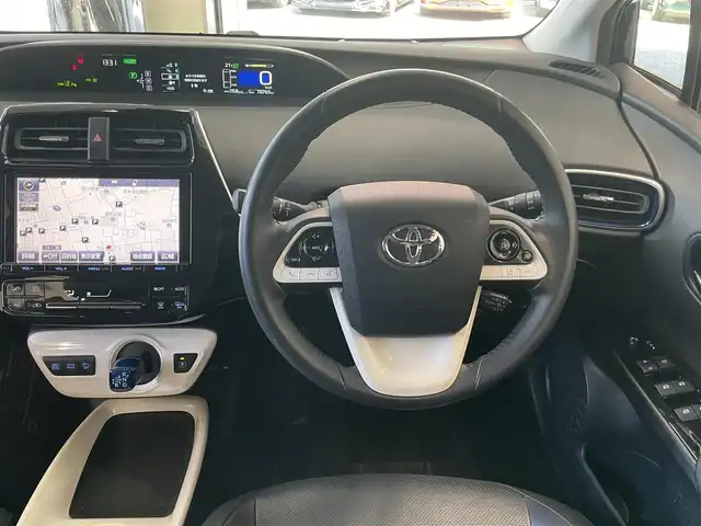 トヨタ プリウス A プレミアム　ツーリングセレ 東京都 2016(平28)年 7.1万km アティチュードブラックマイカ △純正メモリーナビ/　CD/DVD/BT/フルセグ/△バックカメラ/△ETC/△革シート/△革巻きステアリング/△LEDライト/△オートライト/△純正フォグ/△レーダークルーズコントロール/△ステアリングスイッチ/△フロアマット/△ISOFIX/△前席シートヒーター/△プリクラッシュセーフティシステム/△BSM/△パーキングアシスト/△横滑り防止/△クリアランスソナー/△オートハイビームアシスト/△AC１００電源/△プライバシーガラス/△LEDルームランプ/△TVキャンセラー/△ドアバイザー