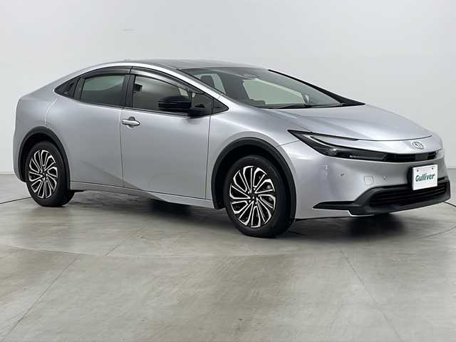 トヨタ プリウス X 道央・札幌 2023(令5)年 6.9万km シルバーメタリック ・4WD/・寒冷地仕様/・ワンオーナー/・トヨタセーフティセンス/・純正ディスプレイオーディオ/（BT USB Miracast フルセグ）/・BSM/・レーダークルーズコントロール/・ステアリングスイッチ/・バックカメラ/・AC1001500W/・バックフォグ/・LEDヘッドライト/・社外ミラー型ドラレコ/・スマートキー/・オートハイビーム/・モデリスタ１７インチAW/・/・