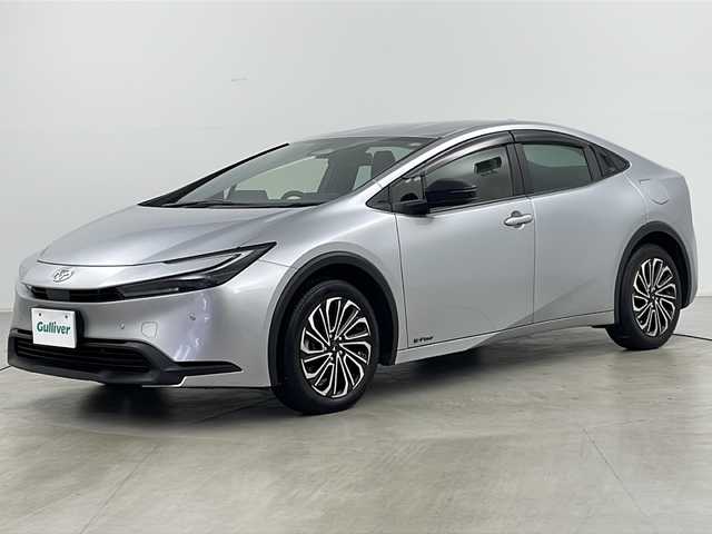 トヨタ プリウス X 道央・札幌 2023(令5)年 6.9万km シルバーメタリック ・4WD/・寒冷地仕様/・ワンオーナー/・トヨタセーフティセンス/・純正ディスプレイオーディオ/（BT USB Miracast フルセグ）/・BSM/・レーダークルーズコントロール/・ステアリングスイッチ/・バックカメラ/・AC1001500W/・バックフォグ/・LEDヘッドライト/・社外ミラー型ドラレコ/・スマートキー/・オートハイビーム/・モデリスタ１７インチAW/・/・