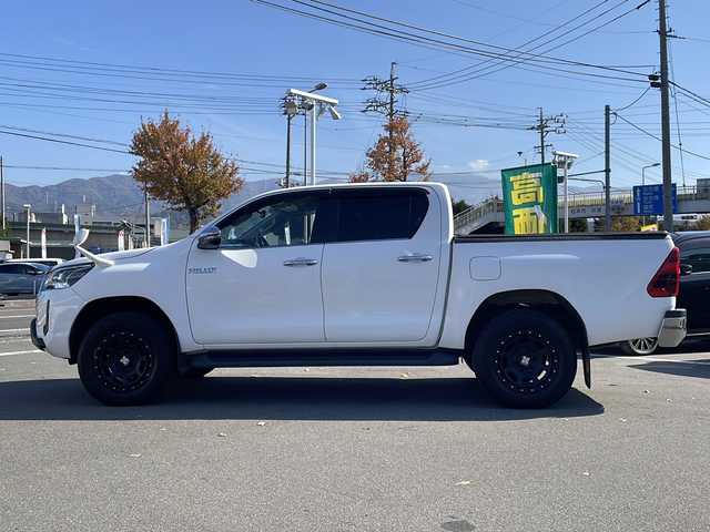 トヨタ ハイラックス Z 長野県 2020(令2)年 5万km スーパーホワイトⅡ 禁煙車/純正ナビ/【NSZT-W66T】/(CD/DVD/フルセグTV/Bluetooth)/セーフティセンス/・レーンディパーチャーアラート/・ロードサインアシスト/・レーダークルーズコントロール/・先行車発進告知/・クリアランスソナー/バックカメラ/ETC/革巻きステアリング/ステアリングスイッチ/アイドリングストップ/LEDヘッドライト/フォグランプ/オートライト/スマートキー/Pスタート/電動格納ミラー/XTREME-J　17インチAW/純正フロアマット/純正AWスタッドレス積み込み