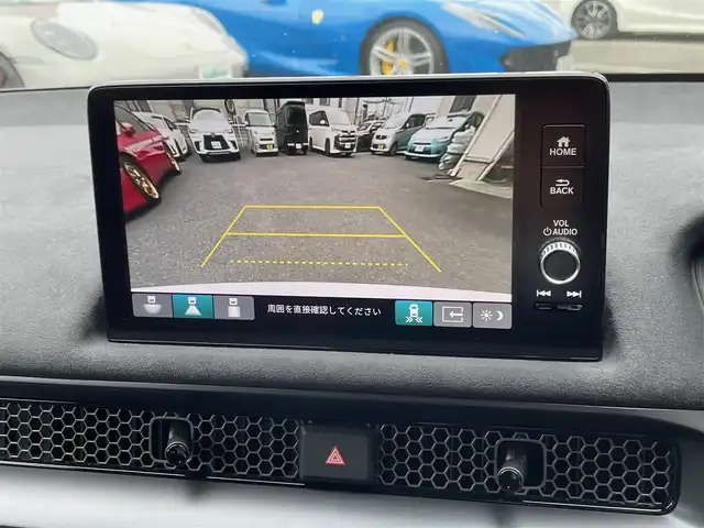 ホンダ シビック タイプR レーシングブラックPKG 神奈川県 2025(令7)年 0.1万km チャンピオンシップホワイト ワンオーナー/サイドステップイルミ/純正フロアマット/ナンバーフレーム/純正メモリーナビ・地デジTV/バックモニター/ビルトインETC2.0/純正USB/BT再生/ワイヤレス充電/ホンダセンシング/レーダークルーズコントロール/PCS/LKA/BSM/標識検知/コーナーセンサー/純正19インチAW/ブレンボブレーキ/LEDライト/前後ドライブレコーダー/プッシュスタート/スマートキー×2/保証書・取説あり