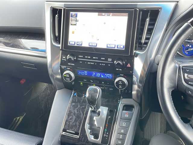 トヨタ ヴェルファイア ハイブリット ZR 青森県 2019(平31)年 11.2万km ホワイトパールクリスタルシャイン 4WD/OP寒冷地仕様/OP JBLプレミアムサウンド/純正SDナビ・フルセグTV/CD・DVD・Bluetooth・SD/OPパノラミックビューモニター/OPデジタルインナーミラー/黒合皮シート/前席エアシート・シートヒーター/両側パワースライドドア/OPパワーバックドア/セーフティセンス/プリクラッシュセーフティ/レーダークルーズコントロール/レーントレーシングアシスト/アダプティブハイビーム/インテリジェントクリアランスソナー/OPブラインドスポットモニター/前後ドライブレコーダー/ワイパーデアイサー/OP AC100V1500W/ビルトインETC2.0/OP3眼LEDヘッドライト/LEDフォグランプ/LEDリアフォグランプ/社外エアロ/社外車高調(純正車内)