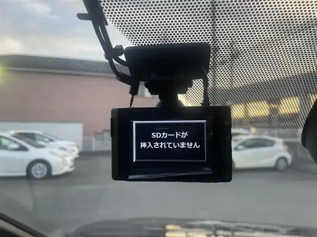 トヨタ ヴォクシー ハイブリッド S－Z 群馬県 2023(令5)年 2.4万km アティチュードブラックマイカ ワンオーナー/純正メモリナビ、地デジ、Bluetooth、CD/バックカメラ/ウインカーミラー/プリクラッシュセーフティ/ブラインドスポットモニター/レーダークルーズコントロール/革巻きステア/前席シートヒーター/ハーフレザーシート/純正フリップダウンモニター/両側パワースライドドア/社外ドライブレコーダー（前後録画）/LEDヘッドライト/ビルトインETC２．０/クリアランスソナー（前後）/オートステップ/AC100V電源/ミラーキャスト/整備手帳、取説