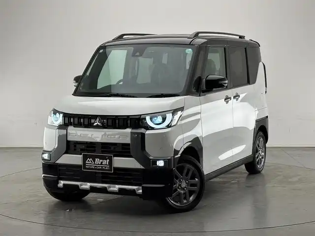 三菱 デリカミニ T プレミアム 長野県 2024(令6)年 0.1万km未満 アメジストブラック/シルキーホワイト AIS検査済み/４ＷＤターボ　/純正アルミ/両側パワスラ/デジタルインナーミラー/Ｂカメラ/全方位/パドルシフト/ルーフレール/追従機能付クルコン/ステアリングヒーター/ハーフレザー/リヤロールサンシェード/プラズマクラスター付リヤサーキュレーター/オートマチックハイビーム/LEDヘッドライト/フォグランプ/衝突被害軽減システム/横滑り防止機能/クリアランスソナー/スマートキー/プッシュスタート/スペアキー/保証書/取扱説明書