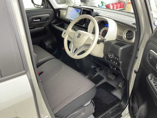 スズキ ワゴンＲ スマイル HYBRID S リミテッド 道央・札幌 2023(令5)年 1.1万km グレーⅡ ・４WD  スズキセーフティサポート/・デュアルセンサーブレーキサポート/・社外９インチフローティング　/　ナビ（CN-F1D9GD）/・Bluetooth/CD/DVD/HDMI/フルセグTV/・両側パワースライドドア/・シートヒーター運転席/助手席/・LEDヘッドライト/オートライト/・オートハイビーム/・横滑り防止装置/・盗難防止装置/・ドライブレコーダー前後（DRV-MR760）/・アイドリングストップ/・ETC/・色番号　E8Z