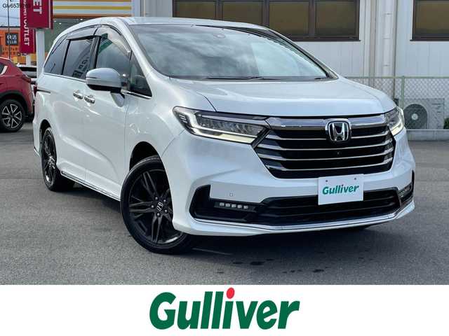 ホンダ オデッセイ アブソルート・EXホンダセンジング 群馬県 2020(令2)年 7.3万km プラチナホワイトパール 純正９型ナビ　/フルセグ・Ｂｌｕｅｔｏｏｔｈ・CD・DVD/全周囲カメラ　/電動リアドア　/衝突軽減ブレーキ　/レーンアシスト　/アダクティブクルーズコントロール　/コーナーセンサー　/前後ドライブレコーダー/黒ハーフレザー/前席パワーシート/ＥＴＣ　/純正マット