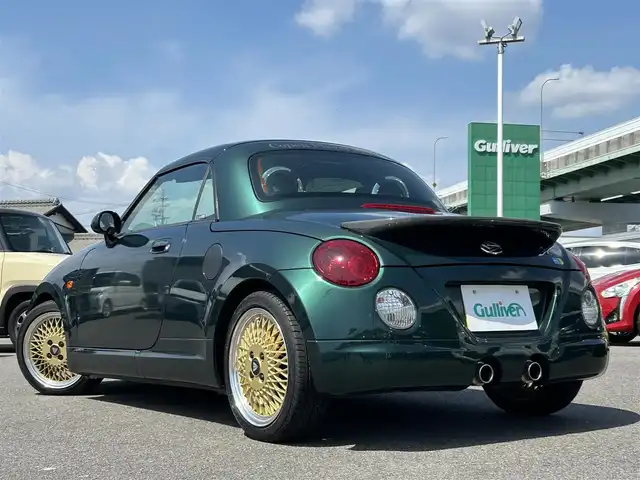 ダイハツ コペン ULTIMATE EDITION 愛知県 2006(平18)年 5.5万km ダークグリーンマイカ オープンカー/メモリーナビ（FM/AM/フルセグTV/USB/BT)/ETC/シートヒーター/純正RECARDシート/純正ビルシュタインショック/純正MOMOステアリング/純正フロアマット/D-SPORTマフラー/カーボンリアスポイラー/ENKEI15インチAW/パワーステアリング/パワーウィンドウ/ABS/ハロゲンライト