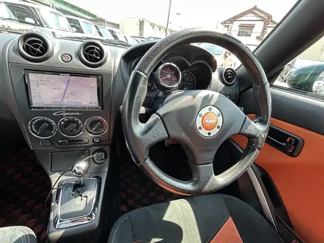 ダイハツ コペン ULTIMATE EDITION 愛知県 2006(平18)年 5.5万km ダークグリーンマイカ オープンカー/メモリーナビ（FM/AM/フルセグTV/USB/BT)/ETC/シートヒーター/純正RECARDシート/純正ビルシュタインショック/純正MOMOステアリング/純正フロアマット/D-SPORTマフラー/カーボンリアスポイラー/ENKEI15インチAW/パワーステアリング/パワーウィンドウ/ABS/ハロゲンライト