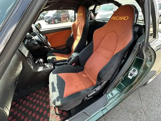 ダイハツ コペン ULTIMATE EDITION 愛知県 2006(平18)年 5.5万km ダークグリーンマイカ オープンカー/メモリーナビ（FM/AM/フルセグTV/USB/BT)/ETC/シートヒーター/純正RECARDシート/純正ビルシュタインショック/純正MOMOステアリング/純正フロアマット/D-SPORTマフラー/カーボンリアスポイラー/ENKEI15インチAW/パワーステアリング/パワーウィンドウ/ABS/ハロゲンライト