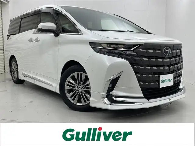 トヨタ アルファード Z 長野県 2024(令6)年 0.8万km プラチナホワイトパールマイカ 純正14型DA/フルセグ/全方位カメラ/モデリスタエアロ/左右独立ムーンルーフ/アドバンストパーク/衝突被害軽減ブレーキ/車線逸脱抑制装置/レーダークルーズコントロール/オートマチックハイビーム/クリアランスソナー/BSM/両側電動スライドドア/置くだけ充電/AC100V/ETC2.0/シートヒーター/ベンチレーション/ステアリングヒーター/純正18インチAW/3眼LEDヘッドライト/スマートキー