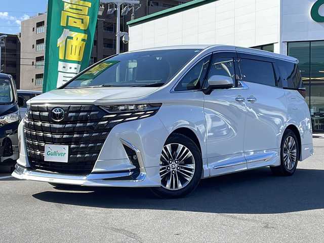 トヨタ アルファード Z 長野県 2024(令6)年 0.8万km プラチナホワイトパールマイカ 純正14型ディスプレイオーディオ/フルセグ/全方位カメラ/モデリスタエアロ/左右独立ムーンルーフ/アドバンストパーク/衝突被害軽減ブレーキ/車線逸脱抑制装置/レーダークルーズコントロール/オートマチックハイビーム/クリアランスソナー/ブラインドスポットモニター/両側電動スライドドア/置くだけ充電/AC100V/ETC2.0/シートヒーター/ベンチレーション/ステアリングヒーター/純正18インチAW/3眼LEDヘッドライト/スマートキー