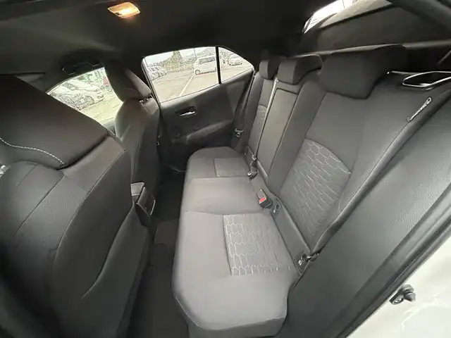 トヨタ カローラ スポーツ ハイブリッドG 愛媛県 2019(令1)年 3.1万km ホワイトパールクリスタルシャイン ワンオーナー/純正ディスプレイオーディオ(ナビ登録済み)/Bluetooth/USB/バックカメラ/ビルトインETC/ドライブレコーダー/トヨタセーフティセンス/アダクティブクルーズコントロール/プリクラッシュセーフティ/ブラインドスポットモニター/リヤクロストラフィックアラート/レーンキープアシストシステム/パーキングサポートブレーキ/ロードサインアシスト/LEDヘッドライト/オートライト/オートマチックハイビーム/電動パーキング/オートホールド/ドライブモード/純正16インチアルミホイール/純正フロアマット/純正ドアバイザー/トノカバー/プッシュスタート/スマートキー/スペアキー１本/保証書/取扱説明書