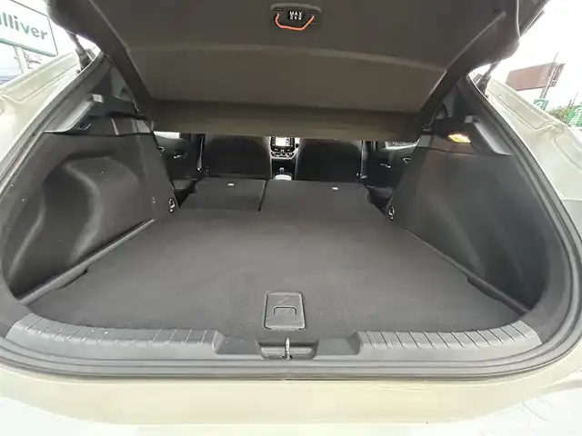 トヨタ カローラ スポーツ ハイブリッドG 愛媛県 2019(令1)年 3.1万km ホワイトパールクリスタルシャイン ワンオーナー/純正ディスプレイオーディオ(ナビ登録済み)/Bluetooth/USB/バックカメラ/ビルトインETC/ドライブレコーダー/トヨタセーフティセンス/アダクティブクルーズコントロール/プリクラッシュセーフティ/ブラインドスポットモニター/リヤクロストラフィックアラート/レーンキープアシストシステム/パーキングサポートブレーキ/ロードサインアシスト/LEDヘッドライト/オートライト/オートマチックハイビーム/電動パーキング/オートホールド/ドライブモード/純正16インチアルミホイール/純正フロアマット/純正ドアバイザー/トノカバー/プッシュスタート/スマートキー/スペアキー１本/保証書/取扱説明書