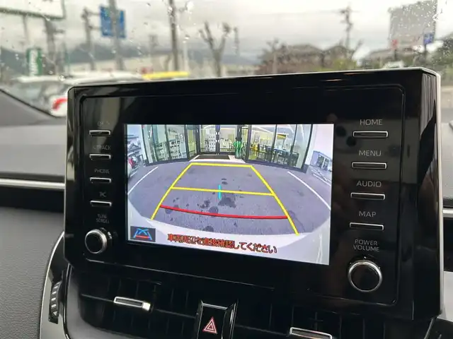 トヨタ カローラ スポーツ ハイブリッドG 愛媛県 2019(令1)年 3.1万km ホワイトパールクリスタルシャイン ワンオーナー/純正ディスプレイオーディオ(ナビ登録済み)/Bluetooth/USB/バックカメラ/ビルトインETC/ドライブレコーダー/トヨタセーフティセンス/アダクティブクルーズコントロール/プリクラッシュセーフティ/ブラインドスポットモニター/リヤクロストラフィックアラート/レーンキープアシストシステム/パーキングサポートブレーキ/ロードサインアシスト/LEDヘッドライト/オートライト/オートマチックハイビーム/電動パーキング/オートホールド/ドライブモード/純正16インチアルミホイール/純正フロアマット/純正ドアバイザー/トノカバー/プッシュスタート/スマートキー/スペアキー１本/保証書/取扱説明書