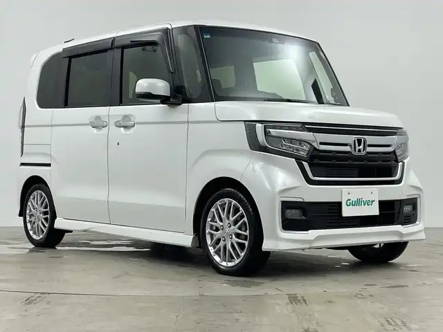 ホンダ Ｎ ＢＯＸ カスタム L ターボ 鹿児島県 2021(令3)年 3.7万km プラチナホワイトパール 禁煙車/ホンダセンシング/・衝突軽減ブレーキ/・レーンキープアシスト/・アダプティブクルーズコントロール/・オートハイビームアシスト/社外８V型SDナビ/・CD.DVD.SD.BT/フルセグTV/バックモニター/両側パワースライドドア/前席シートヒーター/ビルトインETC/LEDヘッドライト/LEDフォグランプ/純正ドライブレコーダー/革巻ステアリングホイール/ステアリングスイッチ/ECONスイッチ/クリアランスソナー/横滑り防止装置/プッシュスタート/スマートキー2個/純正14インチアルミホイール/純正フロアマット/シートバックテーブル/ロールサンシェード