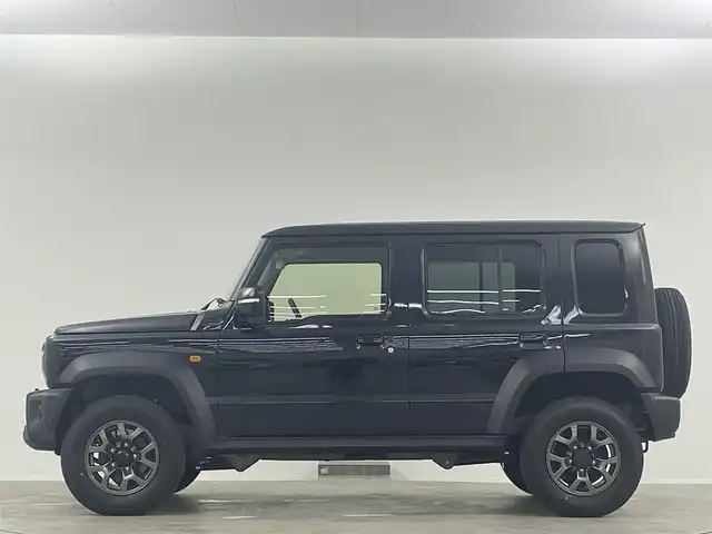 スズキ ジムニー ノマド FC 埼玉県 2025(令7)年 0.1千km 黒 登録済未使用車 シートヒーター 衝突被害軽減 LEDヘッドライト　レーダークルーズコントロール　スマートキー　純正フロアマット　背面タイヤ　純正15インチアルミ　ダウンヒルアシストコントロール　