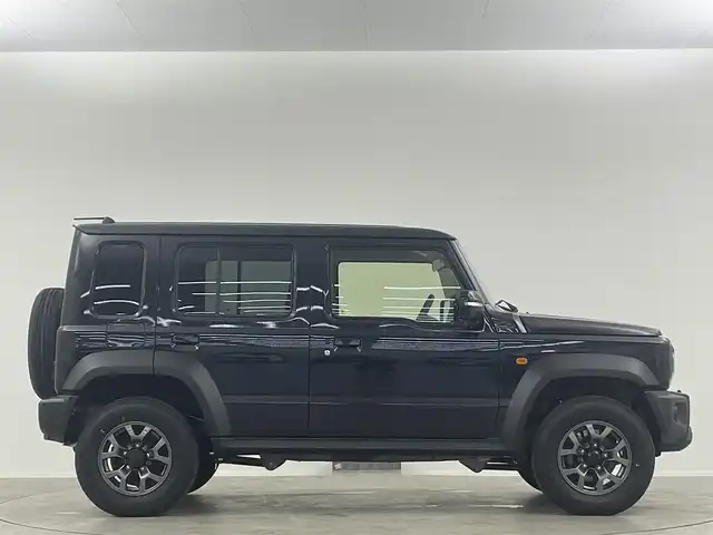スズキ ジムニー ノマド FC 埼玉県 2025(令7)年 0.1千km 黒 登録済未使用車 シートヒーター 衝突被害軽減 LEDヘッドライト　レーダークルーズコントロール　スマートキー　純正フロアマット　背面タイヤ　純正15インチアルミ　ダウンヒルアシストコントロール　