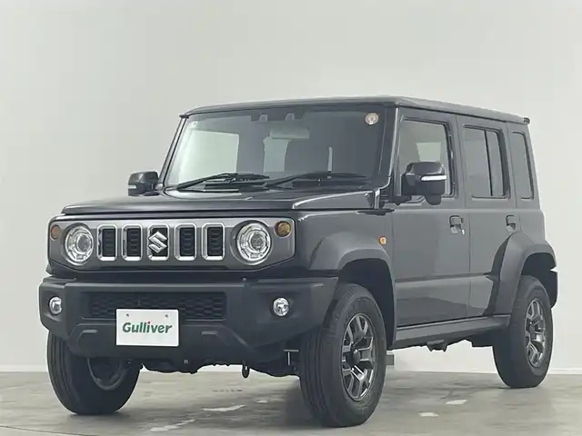 スズキ ジムニー ノマド FC 埼玉県 2025(令7)年 0.1千km 黒 登録済未使用車 シートヒーター 衝突被害軽減 LEDヘッドライト　レーダークルーズコントロール　スマートキー　純正フロアマット　背面タイヤ　純正15インチアルミ　ダウンヒルアシストコントロール　