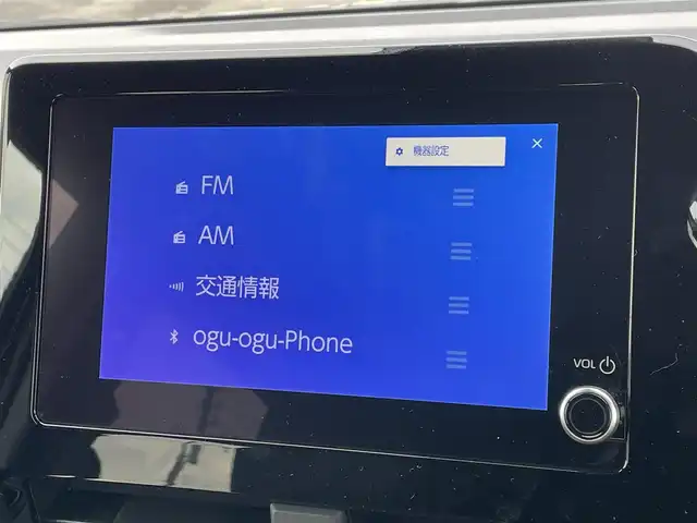 トヨタ ヴォクシー ハイブリッド S－G 道央・札幌 2025(令7)年 1.1万km グリッターブラックガラスフレーク ４WD/寒冷地仕様/純正ディスプレイオーディオ（ナビ付）/AM/FM/BT/トヨタセーフティセンス/プリクラッシュセーフティ/横滑り防止装置/レーダークルーズコントロール/レーンキープアシスト/パーキングアシスト/プロアクティブドライビングアシスト/パーキングサポートブレーキ/ロードサインアシスト/クリアランスソナー/バックカメラ/ビルトインETC2.0/EVMODE/DRIVEMODE切替/ワイパーデアイサー/片側パワースライドドア/革巻きステアリング/ステアリングリモコン/電動パーキング/ブレーキホールド/プッシュスタート/スマートキー/LEDヘッドライト/オートライト/オートハイビーム/ヘッドライトレベライザー/電動格納ミラー/ウィンカーミラー/純正フロアマット/レンタカー登録