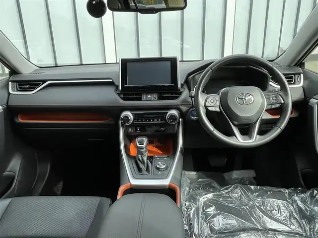 トヨタ ＲＡＶ４ ハイブリッド アドベンチャー 大阪府 2022(令4)年 3.1万km アティチュードブラックマイカ トヨタセーフティセンス　/純正ナビ　/　ＴＶ／Ｂｌｕｅｔｏｏｔｈ／ＣＤ／ＤＶＤ　/バックカメラ　/追従型クルーズコントロール　/MTモード付AT　/ＢＳＭ　/ステアリングヒーター　/メモリ付きパワーシート　/  シートヒーター/エアーシート　/コーナーセンサー　/ETC /ドライブレコーダー　/純正フロアマット　