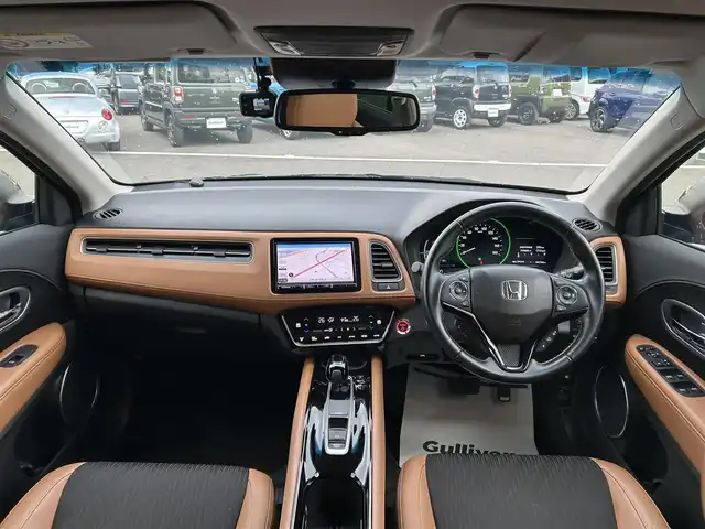 ホンダ ヴェゼル ハイブリッド Z ホンダセンシング 和歌山県 2019(令1)年 3.3万km ルーセブラックM 社外ナビ/バックカメラ/フルセグTV/衝突軽減ブレーキ/クルーズコントロール/レーンキープアシスト/横滑り防止機能/社外フロアマット/純正アルミホイール/パドルシフト/アイドリングストップ/革巻きステアリング/LEDヘッドライト/フォグランプ/オートライト