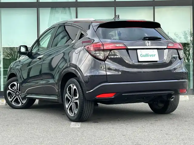 ホンダ ヴェゼル ハイブリッド Z ホンダセンシング 和歌山県 2019(令1)年 3.3万km ルーセブラックM 社外ナビ/バックカメラ/フルセグTV/衝突軽減ブレーキ/クルーズコントロール/レーンキープアシスト/横滑り防止機能/社外フロアマット/純正アルミホイール/パドルシフト/アイドリングストップ/革巻きステアリング/LEDヘッドライト/フォグランプ/オートライト