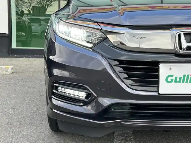 ホンダ ヴェゼル ハイブリッド Z ホンダセンシング 和歌山県 2019(令1)年 3.3万km ルーセブラックM 社外ナビ/バックカメラ/フルセグTV/衝突軽減ブレーキ/クルーズコントロール/レーンキープアシスト/横滑り防止機能/社外フロアマット/純正アルミホイール/パドルシフト/アイドリングストップ/革巻きステアリング/LEDヘッドライト/フォグランプ/オートライト