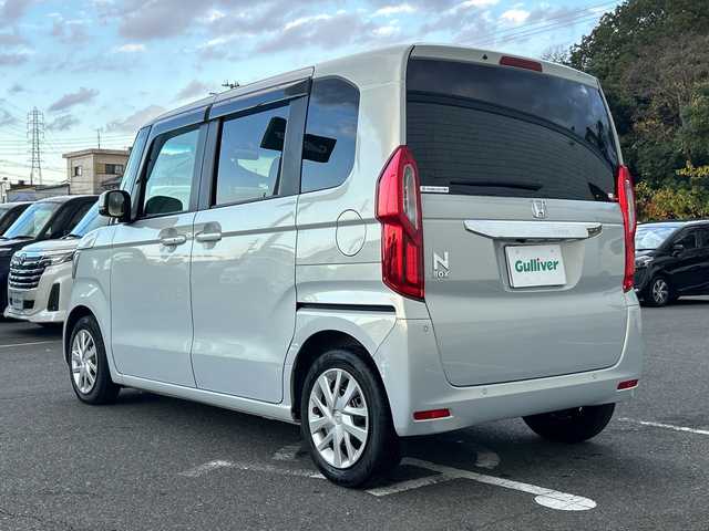 ホンダ Ｎ ＢＯＸ L 大阪府 2024(令6)年 0.6万km プレミアムサンライトホワイトパール 社外ナビ(BT/CD/DVD/USB/SD/フルセグ)/バックカメラ/衝突被害軽減システム/レーンキープアシスト/コーナーセンサー/アダクティブクルーズコントロール/オートライト/オートマチックハイビーム/シートヒーター/純正フロアマット/両側パワースライドドア/アイドリングストップ/ベンチシート/フルフラットシート/チップアップシート/スペアキー×1/LEDヘッドライト