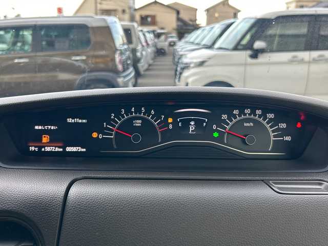 ホンダ Ｎ ＢＯＸ L 大阪府 2024(令6)年 0.6万km プレミアムサンライトホワイトパール 社外ナビ(BT/CD/DVD/USB/SD/フルセグ)/バックカメラ/衝突被害軽減システム/レーンキープアシスト/コーナーセンサー/アダクティブクルーズコントロール/オートライト/オートマチックハイビーム/シートヒーター/純正フロアマット/両側パワースライドドア/アイドリングストップ/ベンチシート/フルフラットシート/チップアップシート/スペアキー×1/LEDヘッドライト