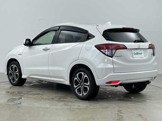 ホンダ ヴェゼル ハイブリッド Z ホンダセンシング 道央・札幌 2016(平28)年 5.5万km ホワイトオーキッドパール ・4WD/・寒冷地仕様/・純正ナビ/・BT&CD&DVD&SD&USB&HDMI&フルセグTV/・バックカメラ/・ホンダセンシング/・レーダークルーズコントロール/・パドルシフト/・レザーシート/・前席シートヒーター/・純正ドライブレコーダー/・ステアリングスイッチ/・ドアミラーヒーター/・ETC/・LEDヘッドライト/・オートライト/・フォグ/・プッシュスタート/・スマートキー