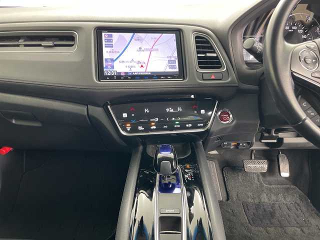 ホンダ ヴェゼル ハイブリッド Z ホンダセンシング 道央・札幌 2016(平28)年 5.5万km ホワイトオーキッドパール ・4WD/・寒冷地仕様/・純正ナビ/・BT&CD&DVD&SD&USB&HDMI&フルセグTV/・バックカメラ/・ホンダセンシング/・レーダークルーズコントロール/・パドルシフト/・レザーシート/・前席シートヒーター/・純正ドライブレコーダー/・ステアリングスイッチ/・ドアミラーヒーター/・ETC/・LEDヘッドライト/・オートライト/・フォグ/・プッシュスタート/・スマートキー