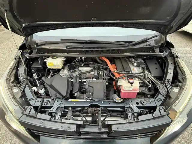 トヨタ ヴォクシー ハイブリッド V 千葉県 2014(平26)年 6.5万km ブラッキッシュアゲハガラスフレーク フリップダウンモニター/バックカメラ/ETC/USB入力端子/両側パワースライドドア/クルーズコントロール/シートヒータ―/純正15インチAW/純正フロアマット/スマートキー