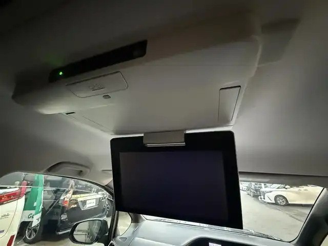 トヨタ ヴォクシー ハイブリッド V 千葉県 2014(平26)年 6.5万km ブラッキッシュアゲハガラスフレーク フリップダウンモニター/バックカメラ/ETC/USB入力端子/両側パワースライドドア/クルーズコントロール/シートヒータ―/純正15インチAW/純正フロアマット/スマートキー