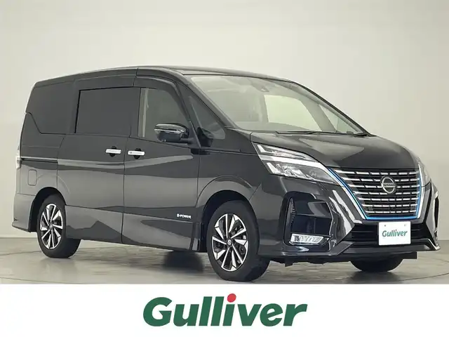 日産 セレナ e－パワー ハイウェイスター V 愛知県 2021(令3)年 4.6万km ダイヤモンドブラック 禁煙車/純正10インチナビ（CD/DVD/Blu-ray/BT/フルセグ）/全方位カメラ/純正11インチフリップダウンモニター/両側パワースライドドア/プロパイロット/ビルトインETC/前方ドラレコ/インテリジェントルームミラー/BSM/革シートカバー/エマージェンシーブレーキ/レーンキープアシスト/前後ソナー/LEDヘッドライト/オートライト/オートハイビーム/電動パーキングブレーキ/オートブレーキホールド/プッシュスタート/スマートキー