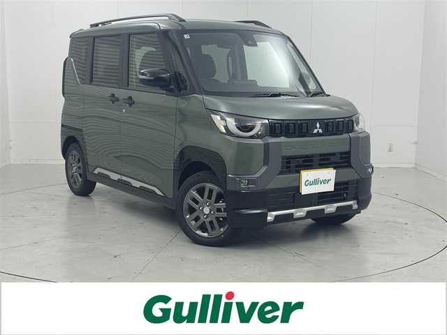 三菱 デリカミニ T プレミアム 茨城県 2025(令7)年 0.1万km未満 ＤグリーンⅡ 登録済未使用車/純正9型ディスプレイオーディオ/全方位カメラ/衝突被害軽減ブレーキ/車線逸脱抑制装置/レーダークルーズコントロール/オートマチックハイビーム/クリアランスソナー/両側電動スライドドア/シートヒーター/ステアリングヒーター/純正15インチAW/LEDヘッドライト/スマートキー