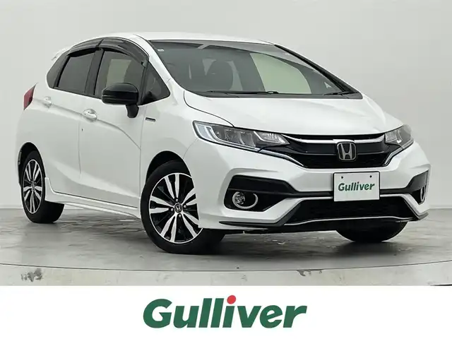 ホンダ フィット ハイブリット S ホンダセンシング 宮城県 2018(平30)年 4.6万km プラチナホワイトパール 衝突軽減ブレーキ　/レーンキープアシスト　/純正ディスプレイオーディオ　/無限２連マフラー　/ＬＥＤヘッドライト　/純正１５インチアルミホイール　/スマートキー　/エンジンスターター　/ＥＴＣ　/バックモニター　/禁煙