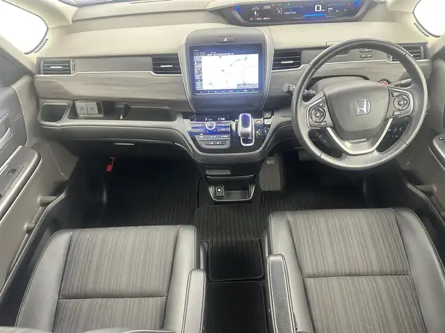 ホンダ フリード ハイブリット EX 愛知県 2019(令1)年 8.9万km プレミアムスパークルブラックパール ホンダセンシング/・衝突軽減ブレーキ〈CMBS〉/・誤発進抑制機能/・LKAS〈車線維持支援システム〉/・歩行者事故低減ステアリング/・路外逸脱抑制機能/・先行車発進お知らせ機能/・標識認識機能/ACC〈アダプティブ・クルーズ・コントロール〉/純正９インチナビ VXM-197VFNi/・フルセグTV/CD/DVD/SD REC/USB/Bluetooth/バックカメラ/ビルドインETC/前後ドライブレコーダー/前席シートヒーター/両側パワースライドドア/Ｓパッケージ/・本革巻ステアリングホイール/・コンビシート&専用インテリア/・15インチアルミホイール/・シートバックアッパーポケット/LEDヘッドライト＋アクティブコーナリングライト/Ｃパッケージ/・プラズマクラスター技術搭載フルオート・エアコンディショナー/・ロールサンシェイド/・コンフォートビューパッケージ/（ヒーテッドドアミラー＋熱線入りフロントウインドウ）