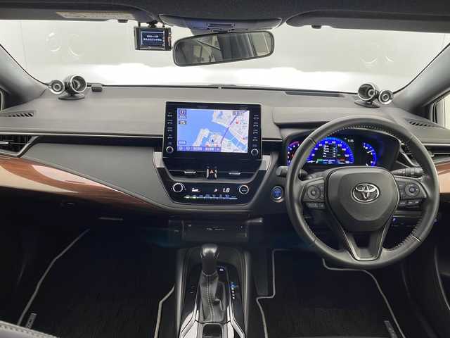 トヨタ カローラツーリング ハイブリッド ダブルバイビー 宮崎県 2021(令3)年 3.8万km ホワイトパールクリスタルシャイン モデリスタフルエアロ/Toyota Safety Sense/〇プリクラシュセーフティ/〇レーントレーシングアシスト/〇ブラインドスポットモニター/〇リアクロストラフィックアラート/〇パーキングサポートブレーキ/〇ヘッドアップディスプレイ/〇ロードサインアシスト/〇レーダークルーズコントロール/〇オートマチックハイビーム/〇クリアランスソナー/〇先行車発進告知/純正9インチディスプレイオーディオ/ナビ機能/CD/DVD/Bluetooth/バックカメラ/ハーフレザーシート/LEDヘッドライト/ビルトインETC2.0/前後ドライブレコーダー/純正18インチAW/保証書/取扱説明書/ナビ取扱説明書