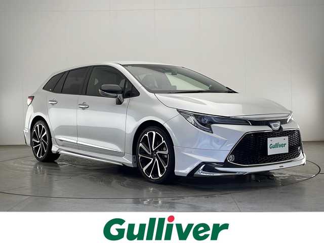 トヨタ カローラツーリング ハイブリッド ダブルバイビー 宮崎県 2021(令3)年 3.8万km ホワイトパールクリスタルシャイン モデリスタフルエアロ/Toyota Safety Sense/〇プリクラシュセーフティ/〇レーントレーシングアシスト/〇ブラインドスポットモニター/〇リアクロストラフィックアラート/〇パーキングサポートブレーキ/〇ヘッドアップディスプレイ/〇ロードサインアシスト/〇レーダークルーズコントロール/〇オートマチックハイビーム/〇クリアランスソナー/〇先行車発進告知/純正9インチディスプレイオーディオ/ナビ機能/CD/DVD/Bluetooth/バックカメラ/ハーフレザーシート/LEDヘッドライト/ビルトインETC2.0/前後ドライブレコーダー/純正18インチAW/保証書/取扱説明書/ナビ取扱説明書