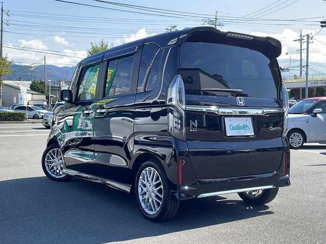 ホンダ Ｎ ＢＯＸ カスタム L ターボ 長野県 2021(令3)年 3.9万km クリスタルブラックパール ターボ/ホンダセンシング/・衝突軽減ブレーキ/・誤発進抑制機能/・後方誤発進抑制機能/・路外逸脱抑制機能/・車線維持支援システム/・アダプティブクルーズコントロール/・先行車発進お知らせ機能/・歩行者事故低減ステアリング/・標識認識機能/純正8インチプレミアムインターナビ/【VXU-217NBi】/(CD/DVD/フルセグTV/BT)/バックカメラ/ビルトインETC/ドライブレコーダー（F・R）/両側パワースライドドア/前席シートヒーター/ハーフレザーシート/革巻きステアリング/ステアリングスイッチ/パドルシフト/LEDヘッドライト/フォグランプ/オートライト/スマートキー/Pスタート/電動格納ミラー/純正15インチAW/純正フロアマット/ドアバイザー