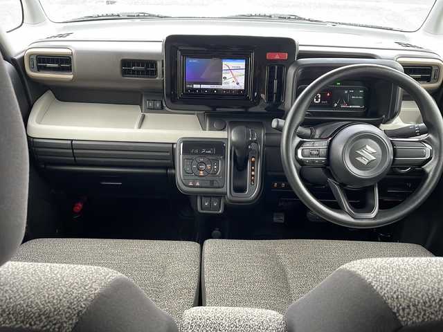 スズキ スペーシア HYBRID X 徳島県 2024(令6)年 4.4万km ピュアホワイトP 社外ナビ/（ラジオ/BT/iPod/USB）/バックカメラ/D/N席シートヒーター/純正14インチアルミホイール/LEDヘッドライト/前後コーナーセンサー/ビルトインETC/純正フロアマット/両側電動スライドドア/アイドリングストップ/電動格納ミラー/オートライト/新車時保証書