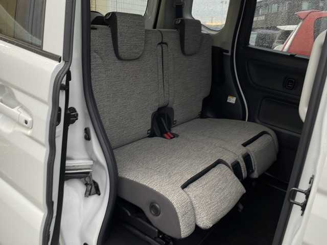 スズキ スペーシア HYBRID X 徳島県 2024(令6)年 4.4万km ピュアホワイトP 社外ナビ/（ラジオ/BT/iPod/USB）/バックカメラ/D/N席シートヒーター/純正14インチアルミホイール/LEDヘッドライト/前後コーナーセンサー/ビルトインETC/純正フロアマット/両側電動スライドドア/アイドリングストップ/電動格納ミラー/オートライト/新車時保証書