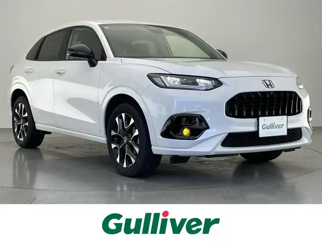 ホンダ ＺＲ－Ｖ ハイブリッド e:HEV Z 愛知県 2024(令6)年 1.7万km プラチナホワイトパール 純正９型ナビ　全方位カメラ　禁煙　ＢＯＳＥ　ワイヤレス充電　ＥＴＣ２．０　ミラー型ドラレコ　シートヒーター　ホンダセンシング　ＢＳＭ　衝突軽減　追従クルコン　ＬＥＤオートライト　パドルシフト　フォグ