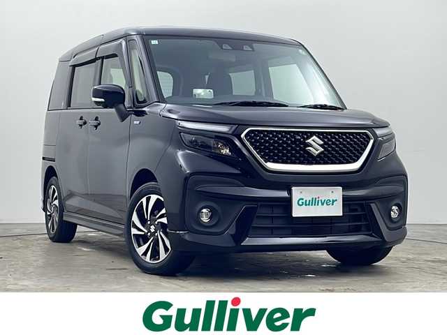 スズキ ソリオ バンディット HV MV 秋田県 2023(令5)年 1.8万km スーパーブラックパール 4WD/純正ナビ/（FM/AM/Bluetooth/フルセグTV/CD/DVD）/全方位カメラ/バックカメラ/両側パワースライドドア/衝突軽減装置/横滑り防止装置/レーンキープアシスト/コーナーセンサー/レーダークルーズコントロール/アイドリングストップ/ETC2.0/ステアリングスイッチ/前席シートヒーター/LEDヘッドライト/フォグランプ/オートライト/オートハイビーム/プッシュスタート/スマートキー/スペアキー/純正アルミホイール/社外フロアマット/電動格納ミラー/ドアバイザー